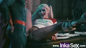 Superman inserts Harley Quinn's bat into his anus