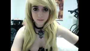 Blonde teen in solo action with her pussy