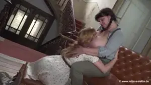 Lesbian teen plays with big tits