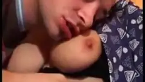 Granny with big tits shows a young man what it's about