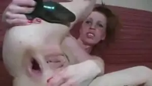 Stretching her own asshole