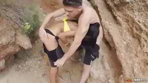 Cool lovers make out by the beach