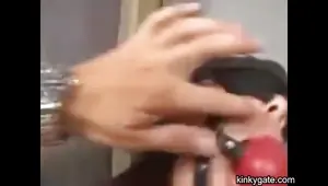 Taming Asian slut with gag, chain and cock