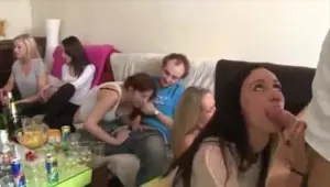 Tattooed young whore enjoying a gang fuck