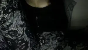 Nipples out, hand under the leggings
