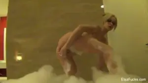 She shaves her clit area and masturbates in the bathtub