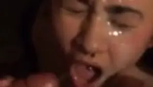 Amateur collects cum on her pierced tongue and face