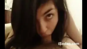 Doe eyed flirt sucks cock with style
