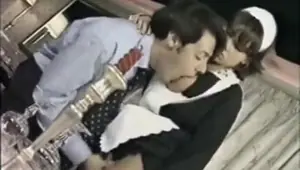 Hotel maid and manager do it on the table