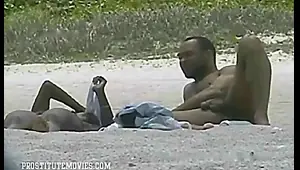 exposed voyeur cam in a nudist beach
