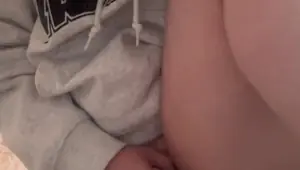 Blonde girl plays with her wet pussy until she squirts all over the floor