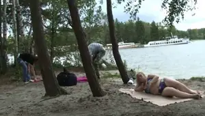 GRANDMA FRIENDS Blonde granma swallows two cocks near lake