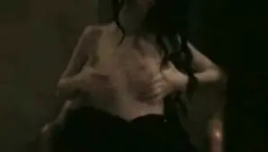 Brunette woman is about to have a very intense orgasm