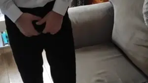 Chubby teen guy in white shirt undressing and showing his bulge