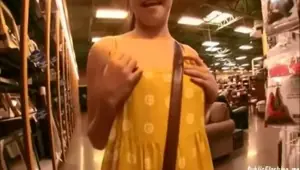 GF in yellow mini dress is flashing pussy and boobs in store