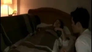 Japanese Wife fucked next to her sleeping husband