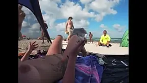 Exhibitionist Wife 511 Mrs Kiss gives us her NUDE BEACH POV view of a VOYEUR JERKING OFF in front of her and several other men watching!