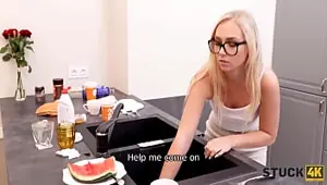 STUCK . Gorgeous charmer got in some trouble while washing the dishes