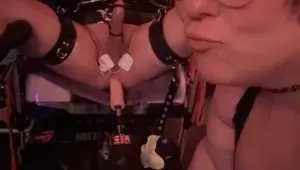 BBW Femdom puts male slave in latex bondage with electro CBT Fuck Machine
