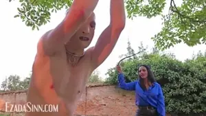 My chattel's dance of pain: Matriarch Ezada Sinn whips Her bound chattel in the garden preview